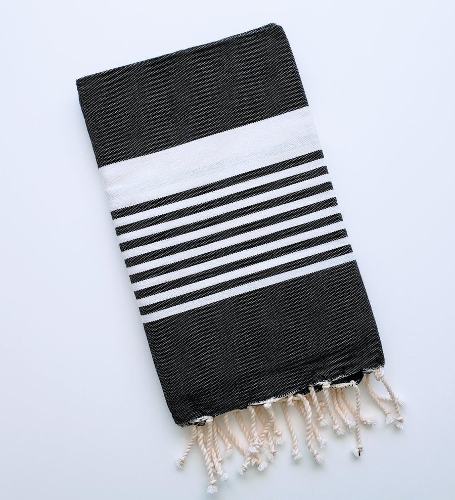 Soft and absorbent chic Turkish bath towel with fringe detail
