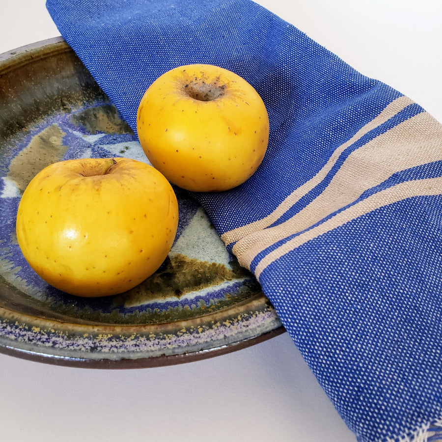  Mini guest towel in blue denim next to bowl of fruit