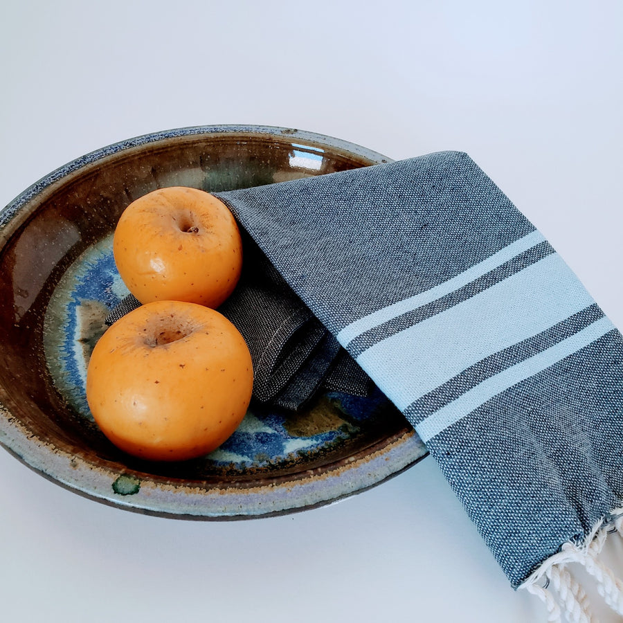  Mini guest towel in denim next to bowl of fruit